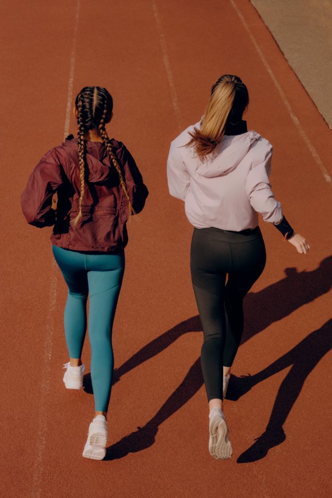 Two runners wearing Kt period-proof leggings